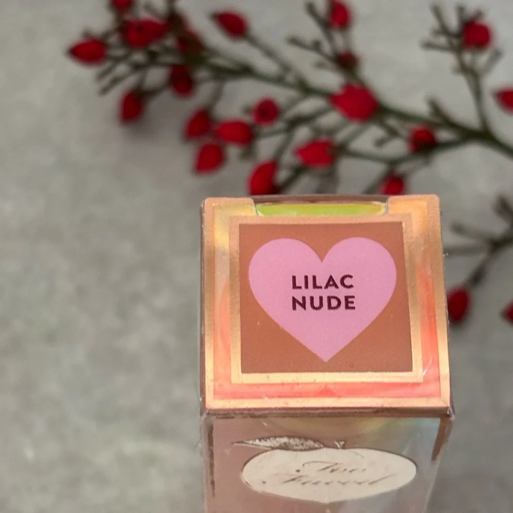 Too Faced Peach Bloom Color Blossomny Lip Balm - color is Lilac Bloom